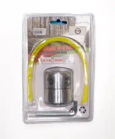 ชุดหัวเอ็นตัดหญ้าอลูมิเนียม-4-รู-รุ่นขันสกรูด้านบน-พร้อมสายเอ็นและประแจแอล-ในแพ็คเกจมาตรฐาน